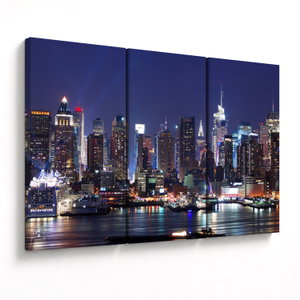 Schilderij - Verlichte wolkenkrabbers van New York (V025150V120803PCS)
