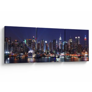 Schilderij - Verlichte wolkenkrabbers van New York (V025150V15050)