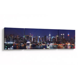 Schilderij - Verlichte wolkenkrabbers van New York (V025150V17050)