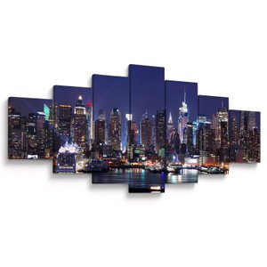 Schilderij - Verlichte wolkenkrabbers van New York (V025150V210100)